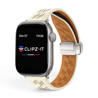Clipz It Perforé white leather Apple Watch strap with tan interior and magnetic clasp, racing-inspired design.